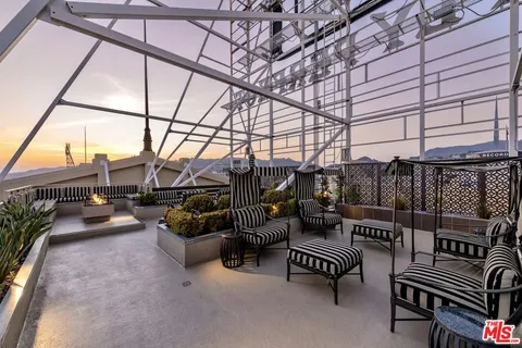 a view of terrace with couch and chairs