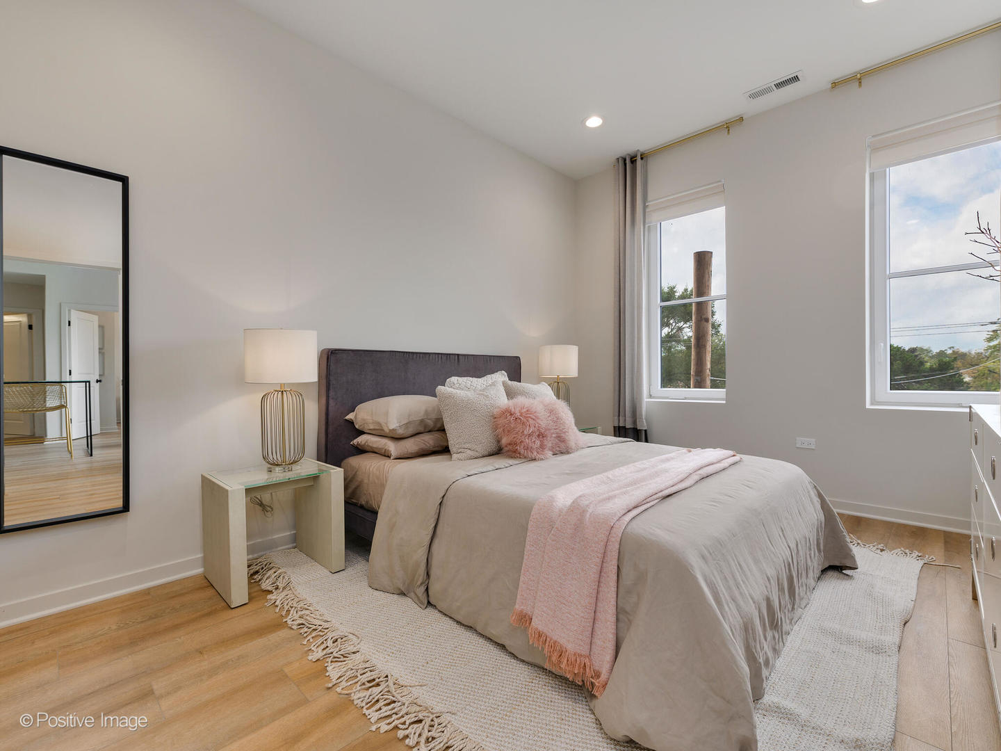 2811 Thatcher Avenue, Unit 204 River Grove, IL 60171 - Photo 12 of 44 a bedroom with a bed and a window