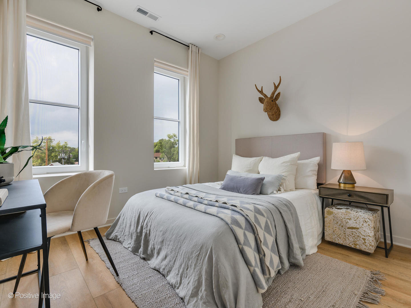 2811 Thatcher Avenue, Unit 204 River Grove, IL 60171 - Photo 17 of 44 a bedroom with a bed and a window