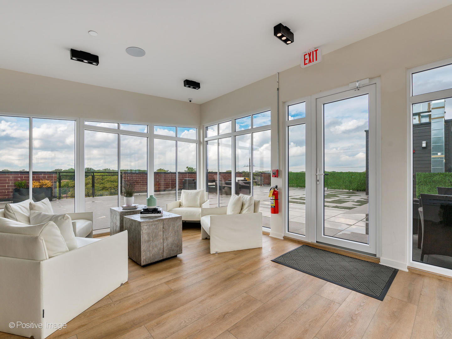 2811 Thatcher Avenue, Unit 204 River Grove, IL 60171 - Photo 22 of 44 a living room with furniture large windows and wooden floor