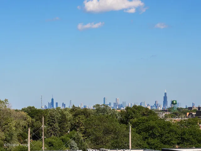 a view of a city with a city skyline in the background