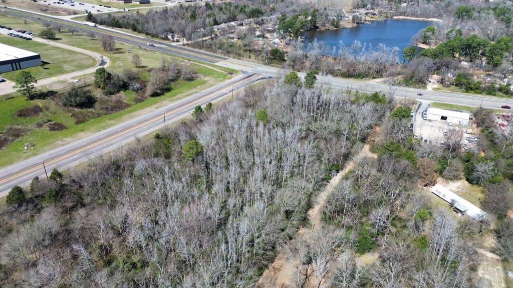 0 Highway 31 West Tyler, TX 75709 - Photo 1 of 6 a view of a forest with a lake