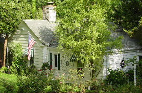 6066 Cunningham Road Rockford, IL 61102 - Photo 1 of 6 a aerial view of a house with plants and trees