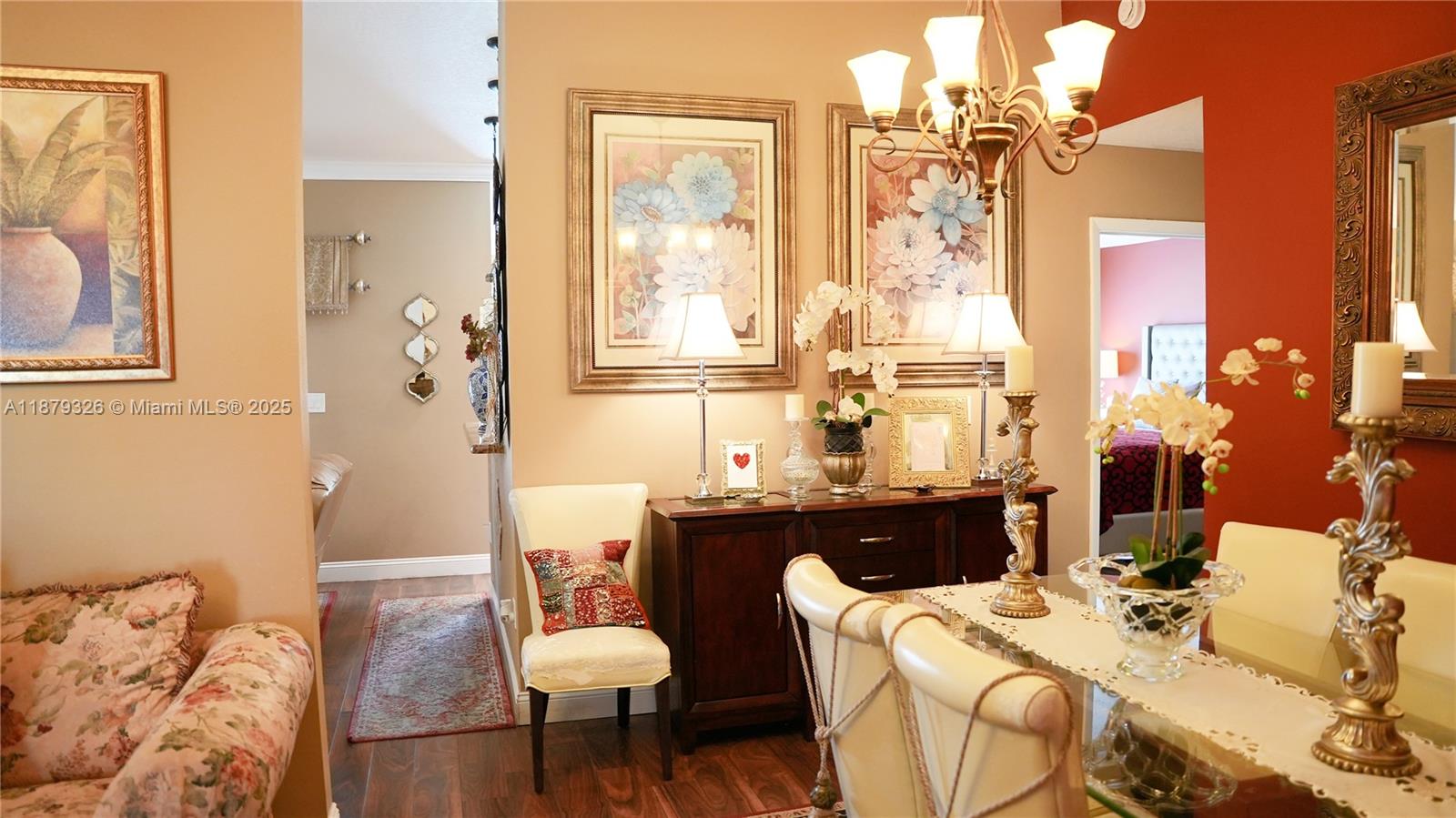 14856 Southwest 174th Street Miami, FL 33187 - Photo 6 of 31 a living room with furniture and wooden floor