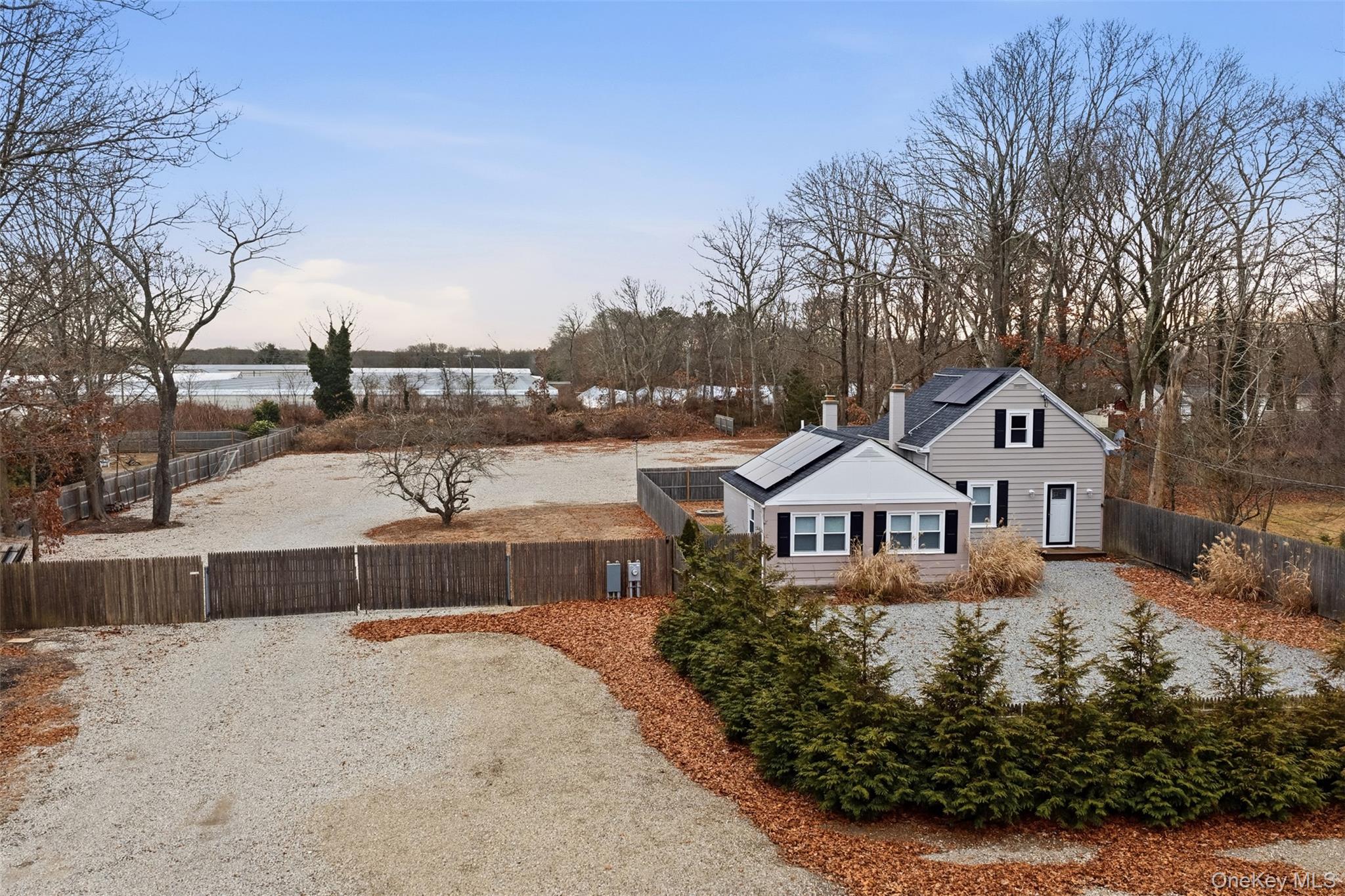 60 Frowein Road Center Moriches, NY 11934 - Photo 2 of 41 a front view of a house with a yard