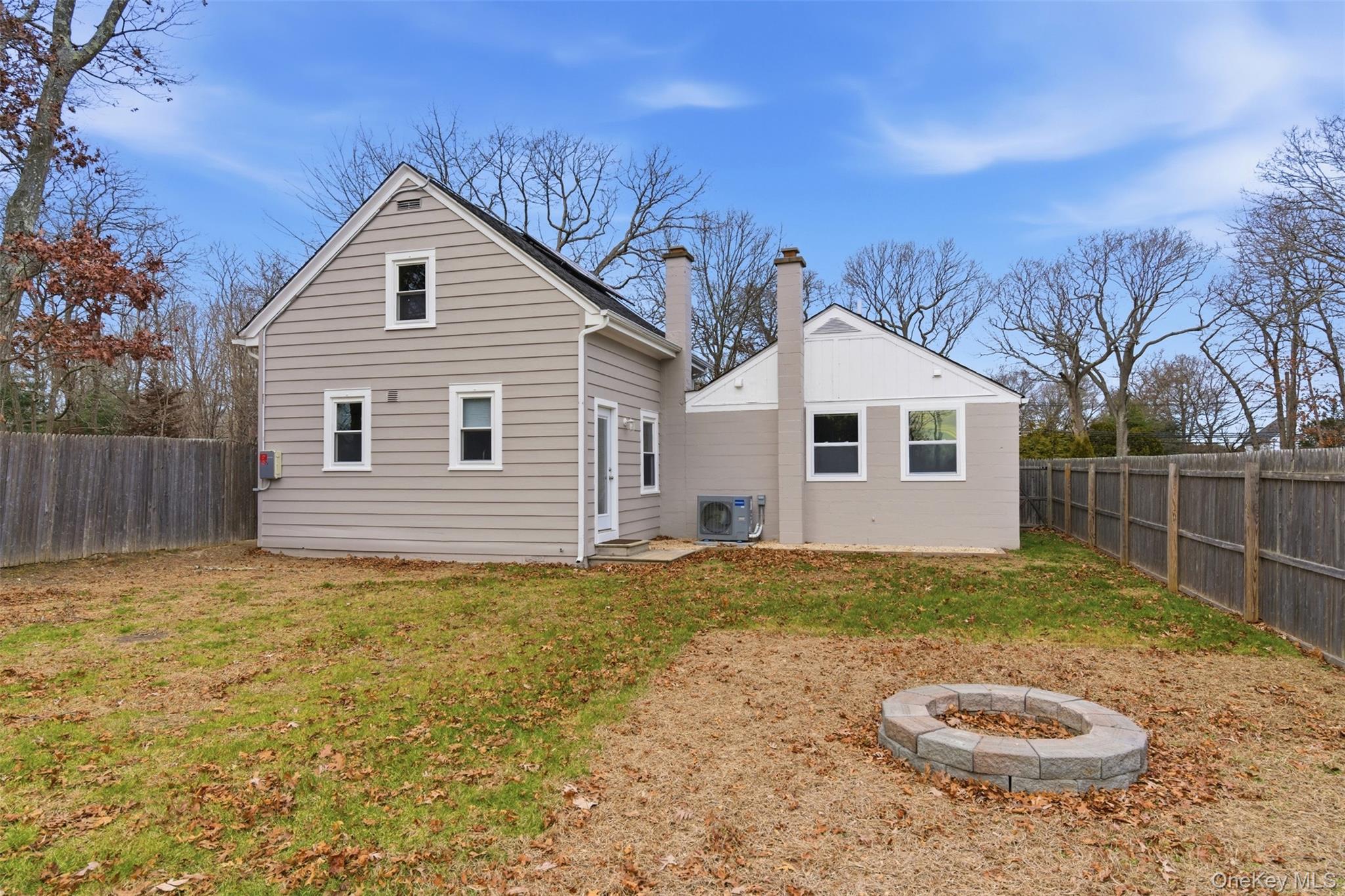 60 Frowein Road Center Moriches, NY 11934 - Photo 21 of 41 a view of a house with a yard
