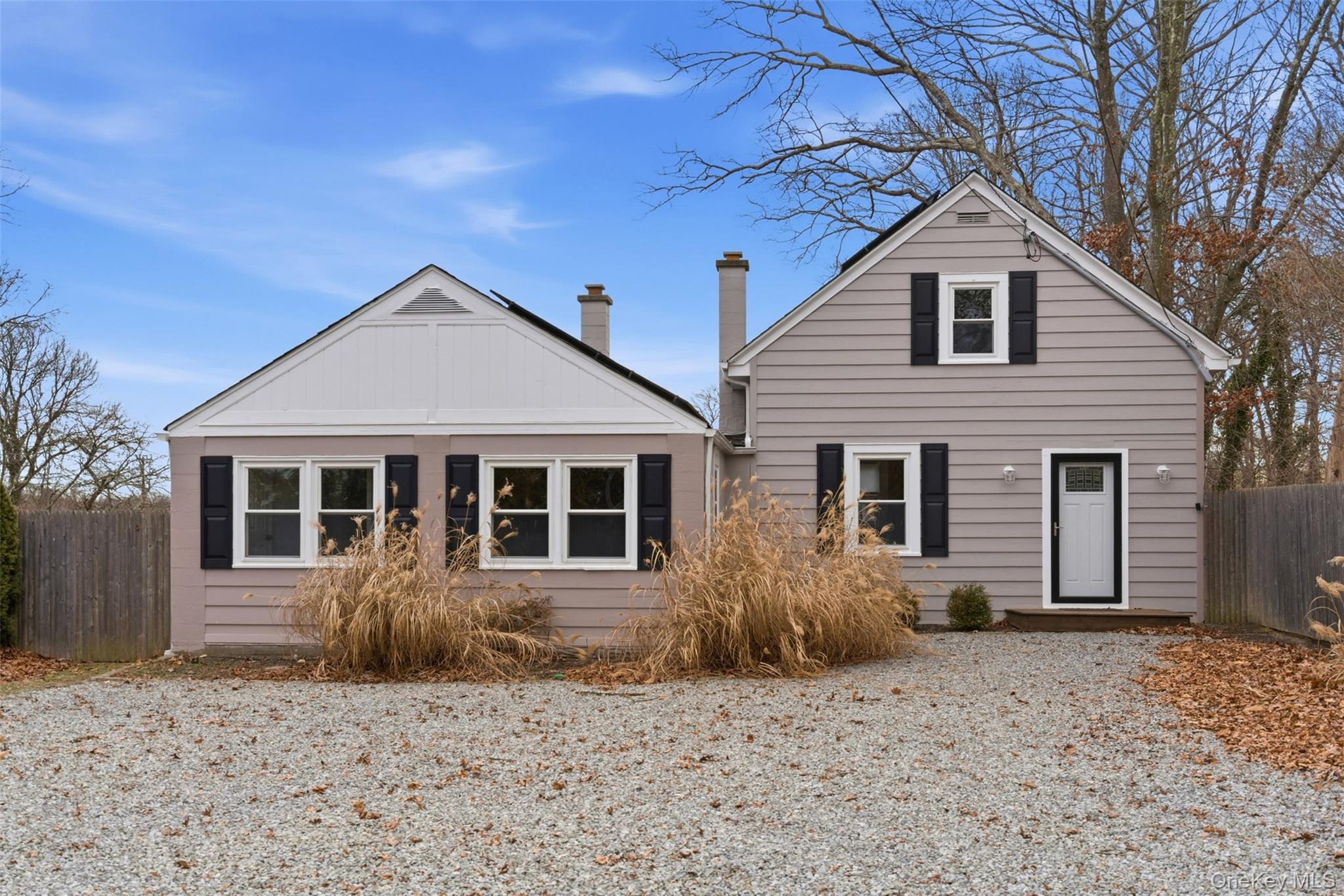 60 Frowein Road Center Moriches, NY 11934 - Photo 29 of 41 a front view of a house with a yard