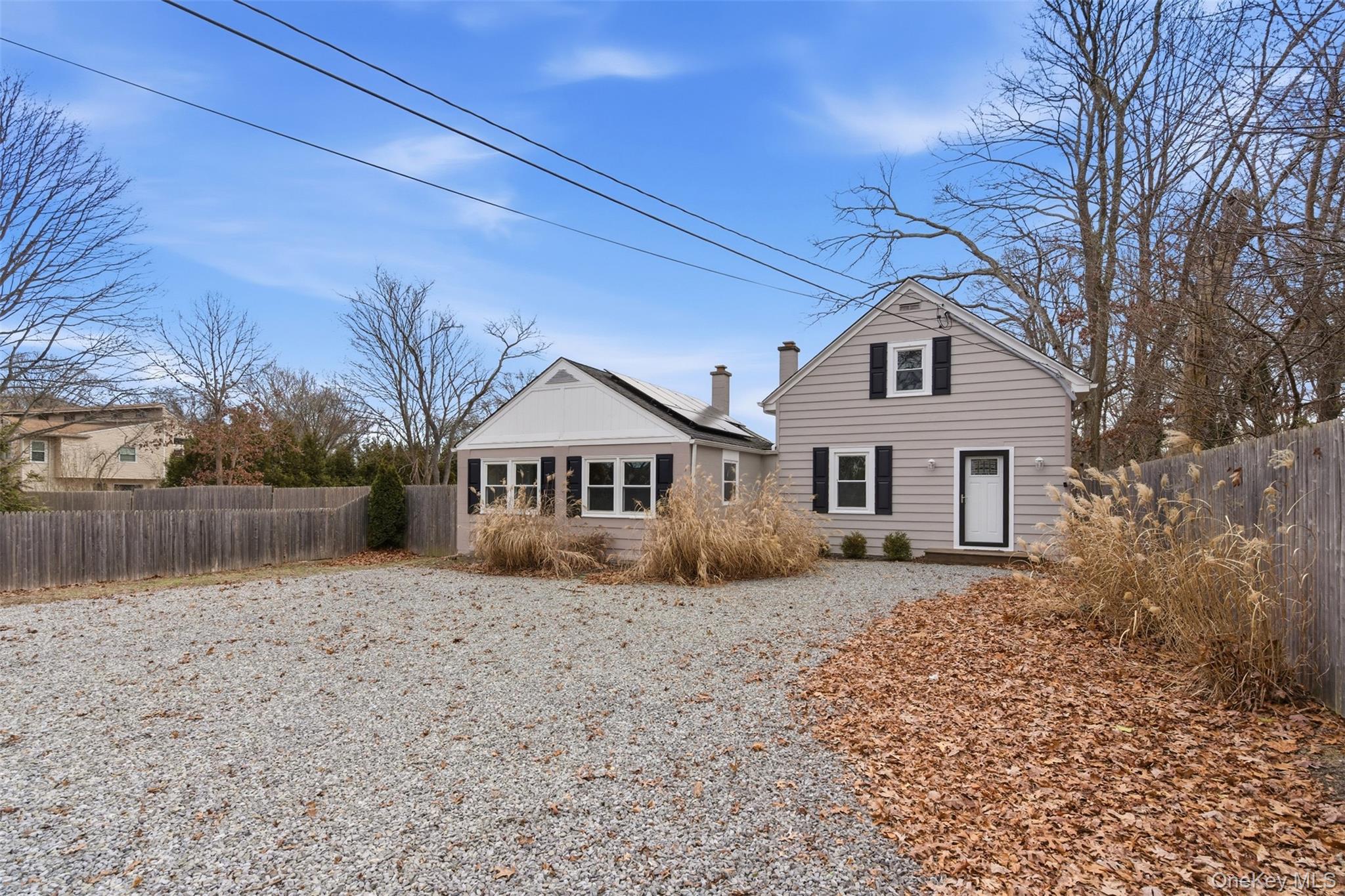 60 Frowein Road Center Moriches, NY 11934 - Photo 30 of 41 a front view of a house with a yard