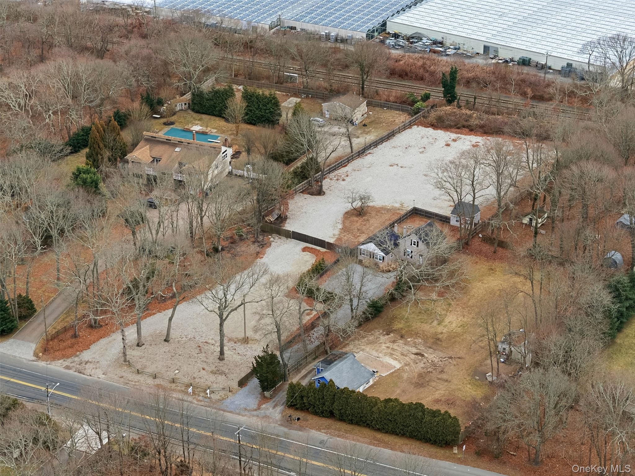 60 Frowein Road Center Moriches, NY 11934 - Photo 35 of 41 an aerial view of residential house with parking