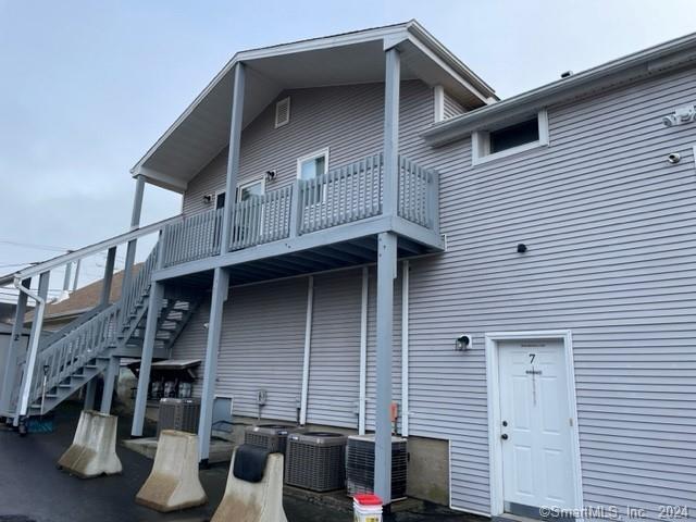 16 Dr Foote Road, Unit 2 Colchester, CT 06415 - Photo 1 of 1 a front view of a house with garage