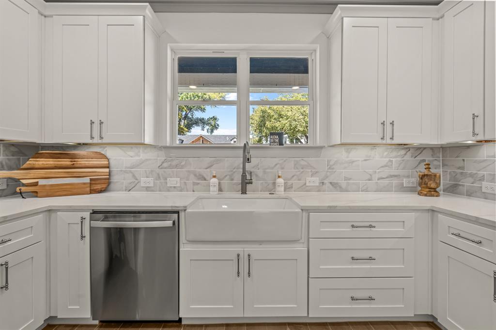 5817 Coleman Street Westworth Village, TX 76114 - Photo 11 of 40 a kitchen with granite countertop a sink and a window