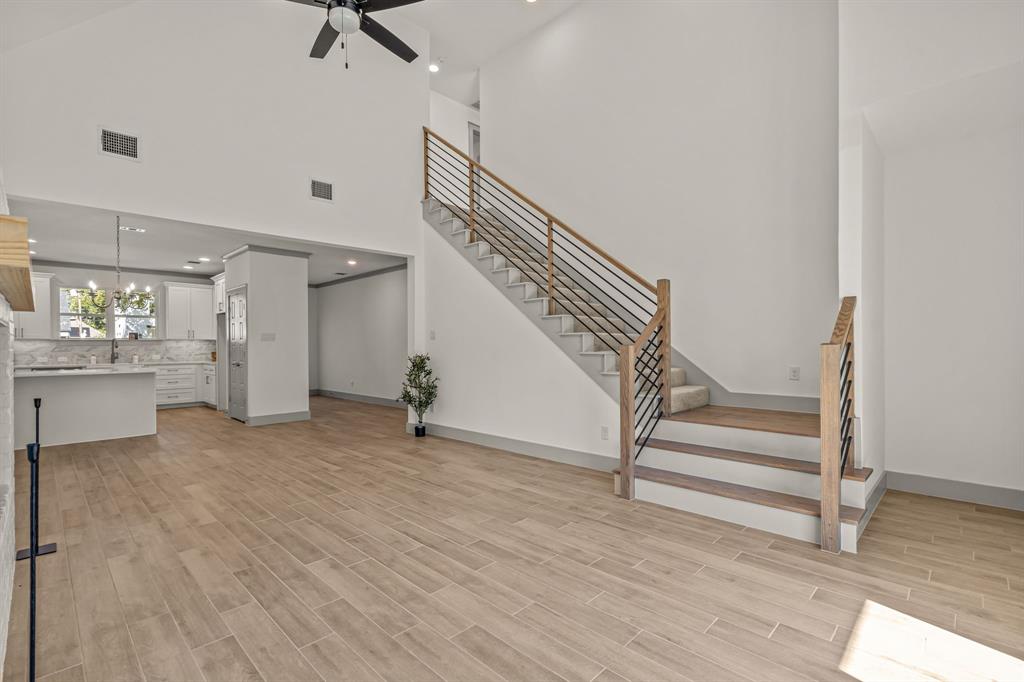 5817 Coleman Street Westworth Village, TX 76114 - Photo 15 of 40 a view of a room with wooden floor and stairs