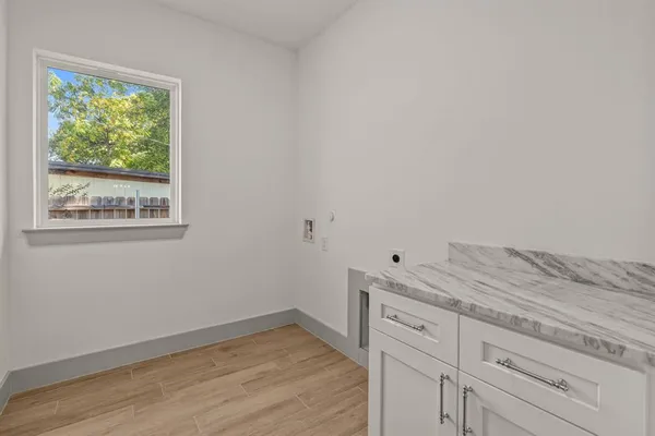 a view of cabinets and wooden floor
