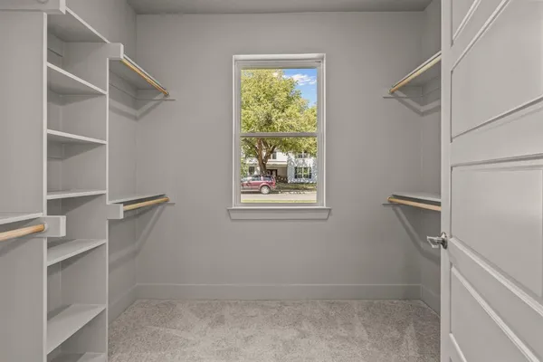 a view of an empty walk in closet