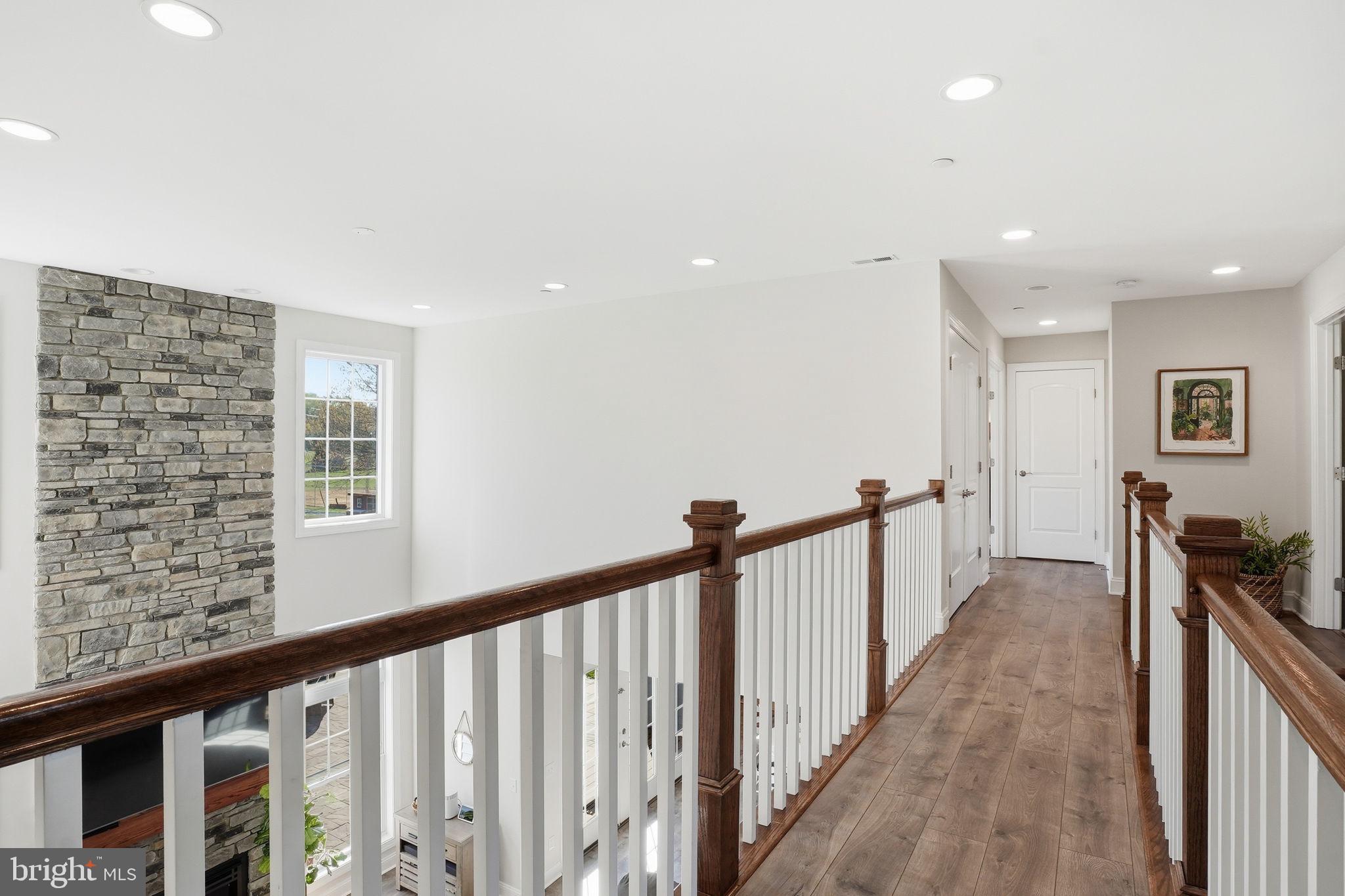3177 Patuxent River Road Davidsonville, MD 21035 - Photo 21 of 51 a view of a hallway with a livingroom