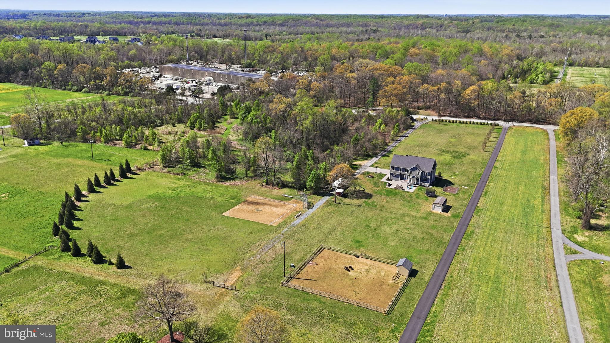 3177 Patuxent River Road Davidsonville, MD 21035 - Photo 3 of 51 an aerial view of a residential houses with outdoor space and trees