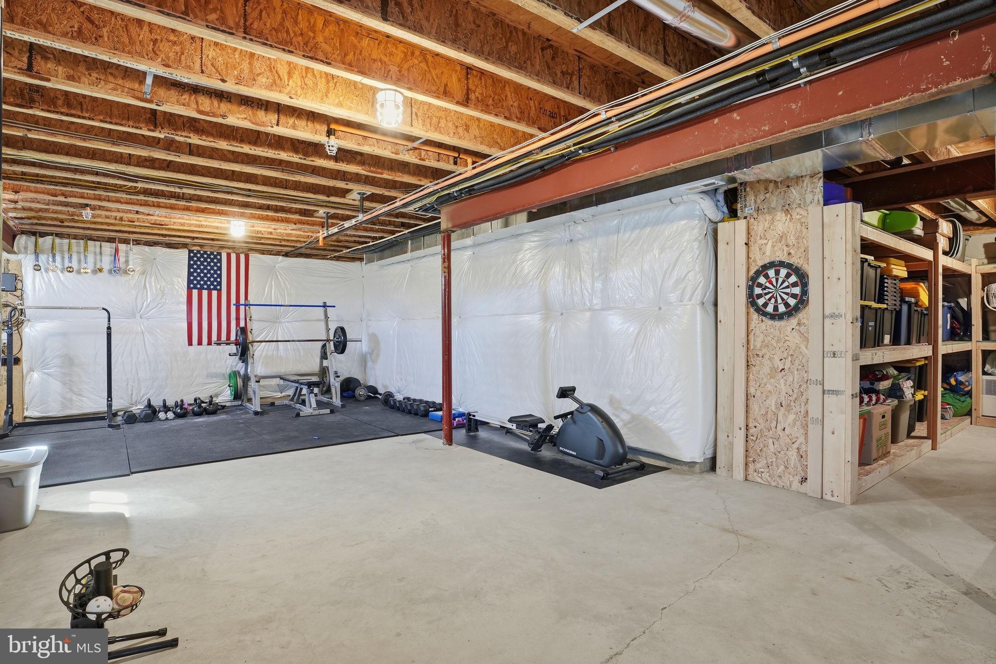 3177 Patuxent River Road Davidsonville, MD 21035 - Photo 31 of 50 a view of a room with gym equipment