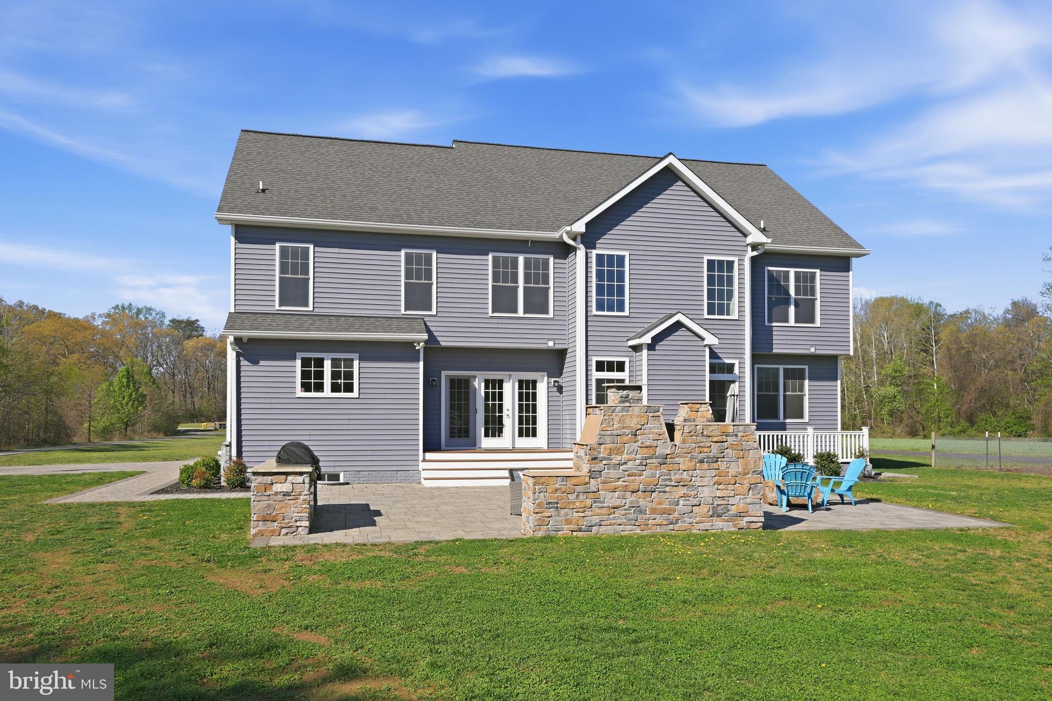 3177 Patuxent River Road Davidsonville, MD 21035 - Photo 36 of 50 a front view of a house with a yard