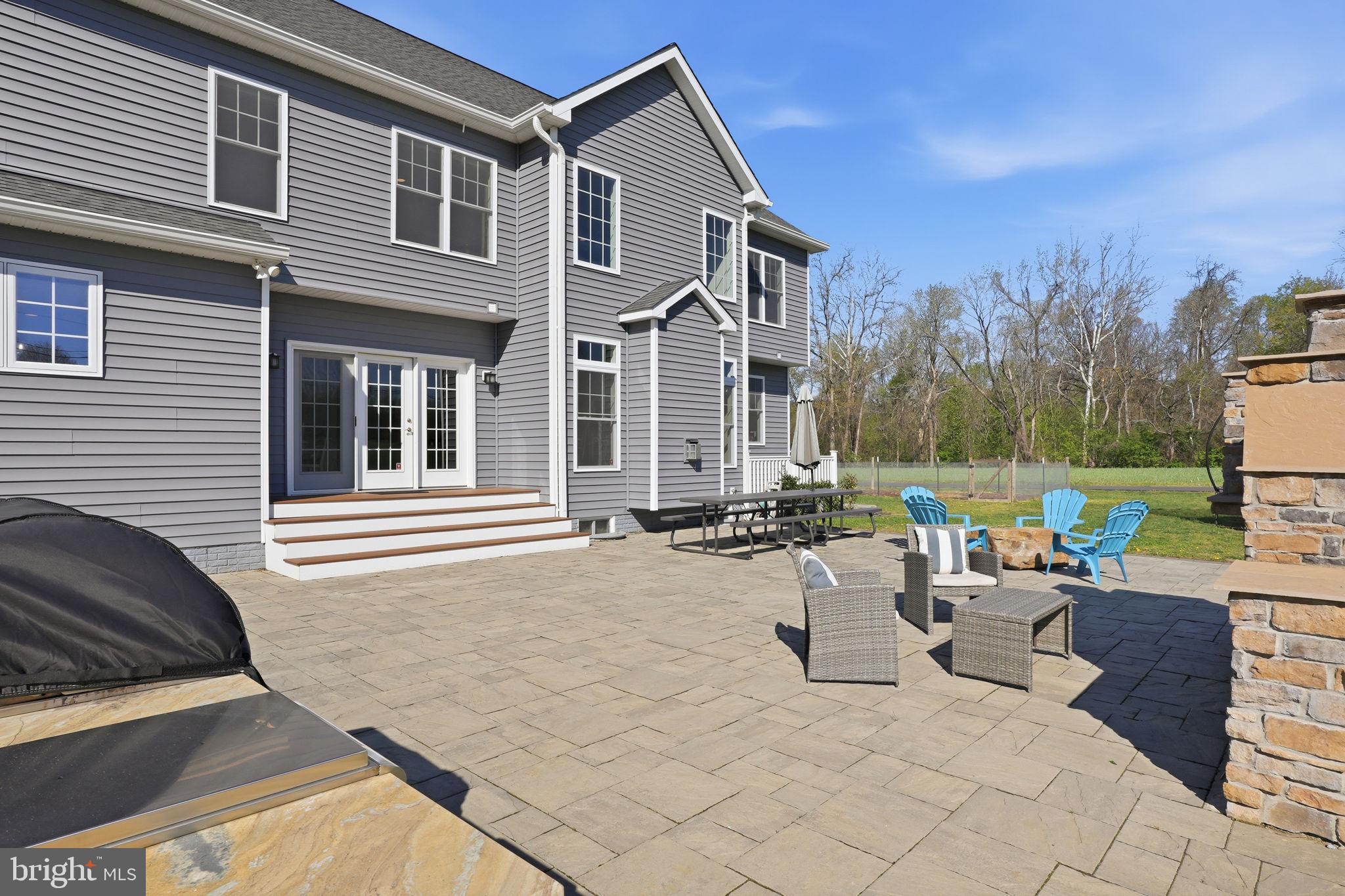 3177 Patuxent River Road Davidsonville, MD 21035 - Photo 37 of 50 a view of a house with backyard and sitting area