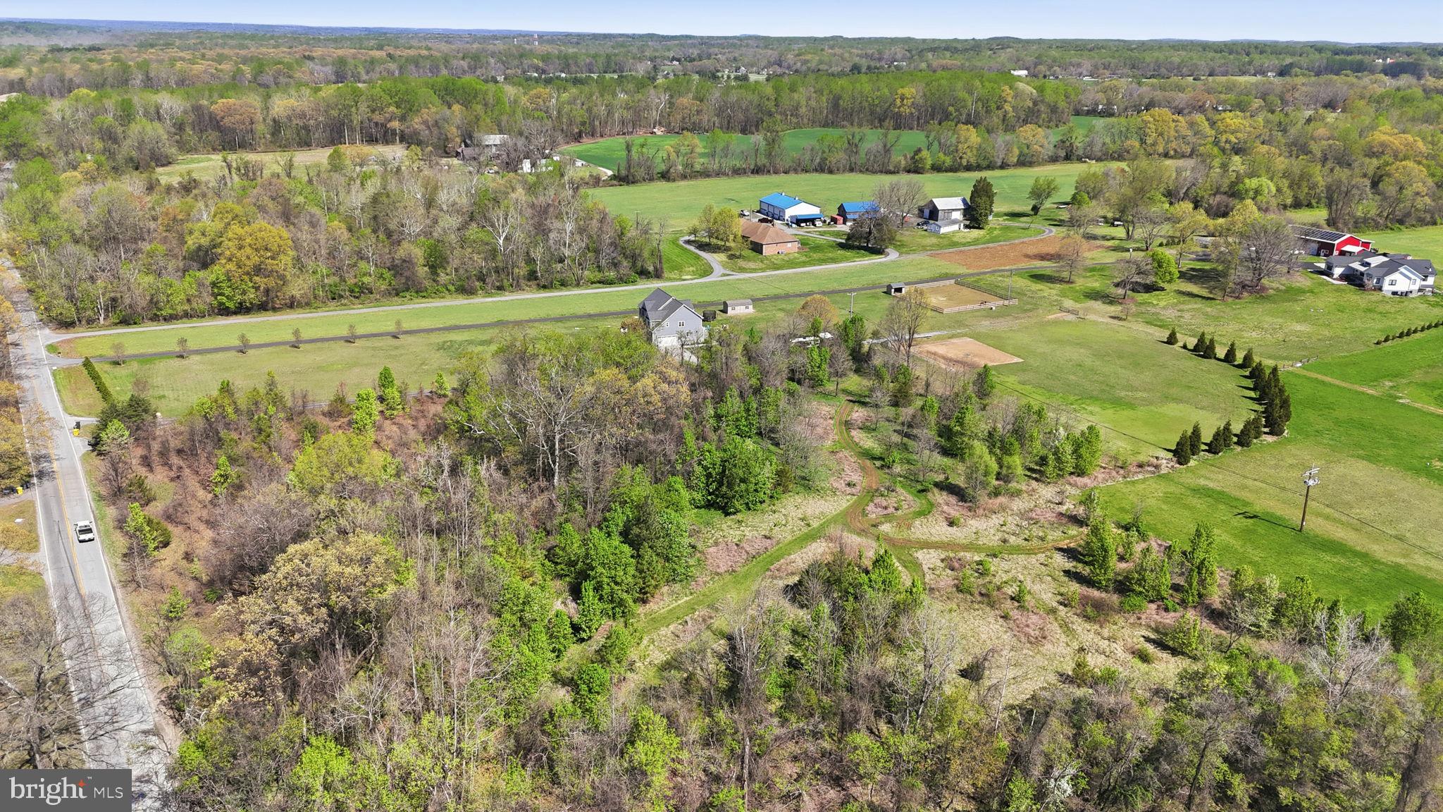 3177 Patuxent River Road Davidsonville, MD 21035 - Photo 5 of 51 a view of a lush green field