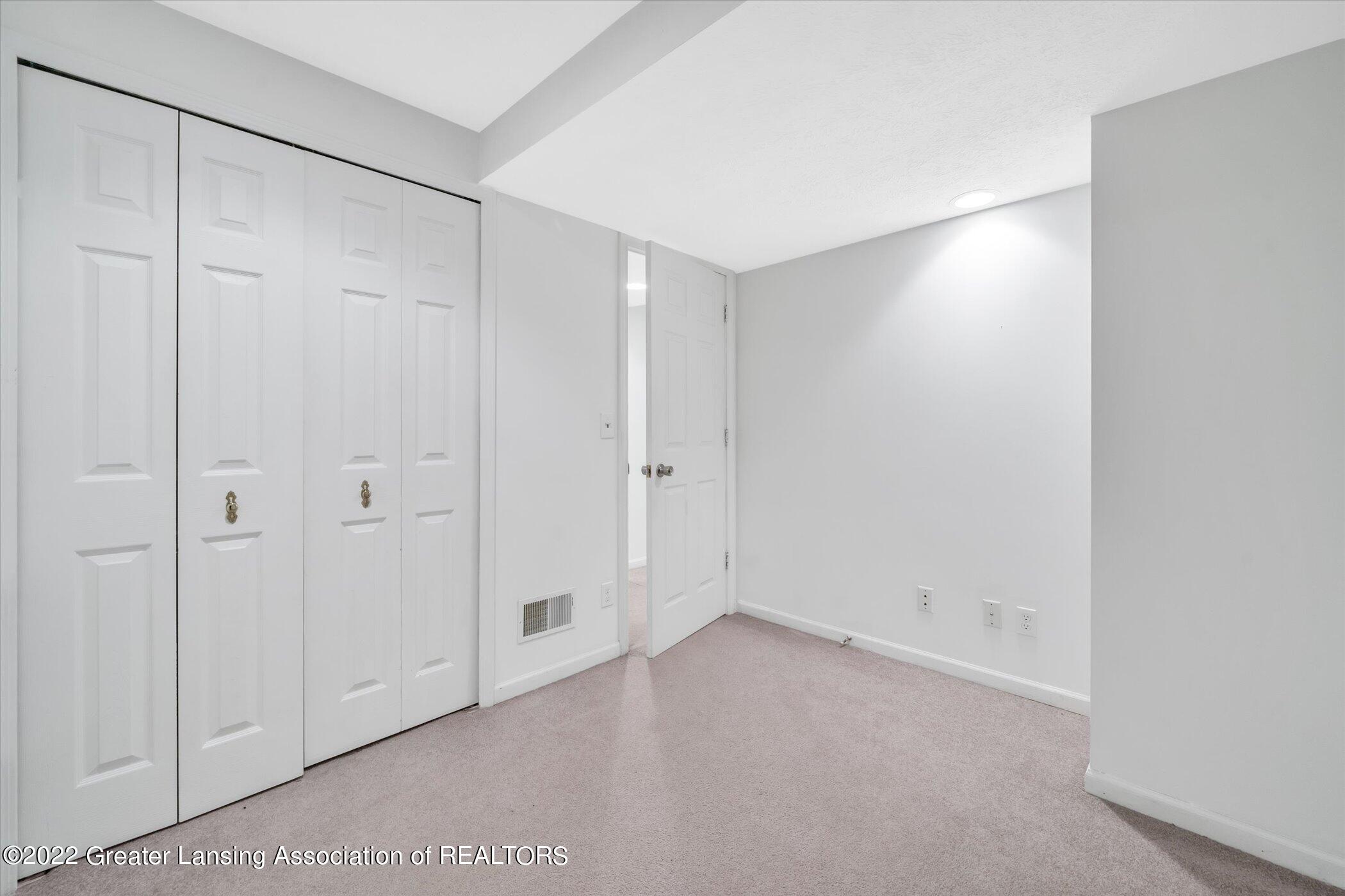 839 Spring Mill Drive Haslett, MI 48840 - Photo 32 of 48 35-839-Spring-Mill-Dr-WindowStill-Real-E