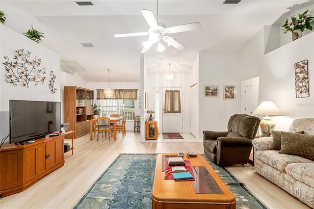 a kitchen with a refrigerator and a sink