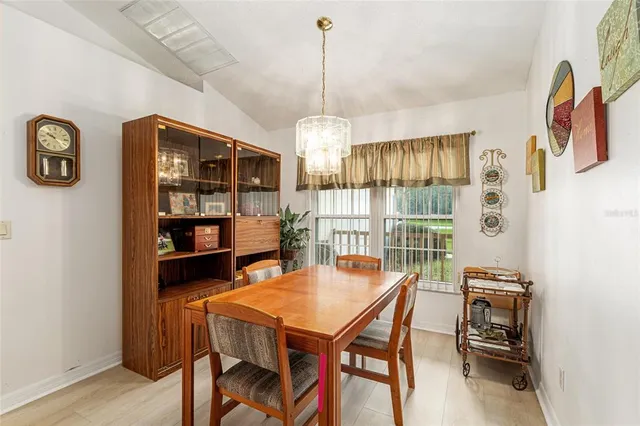 a view of a kitchen with a sink and a stove top oven