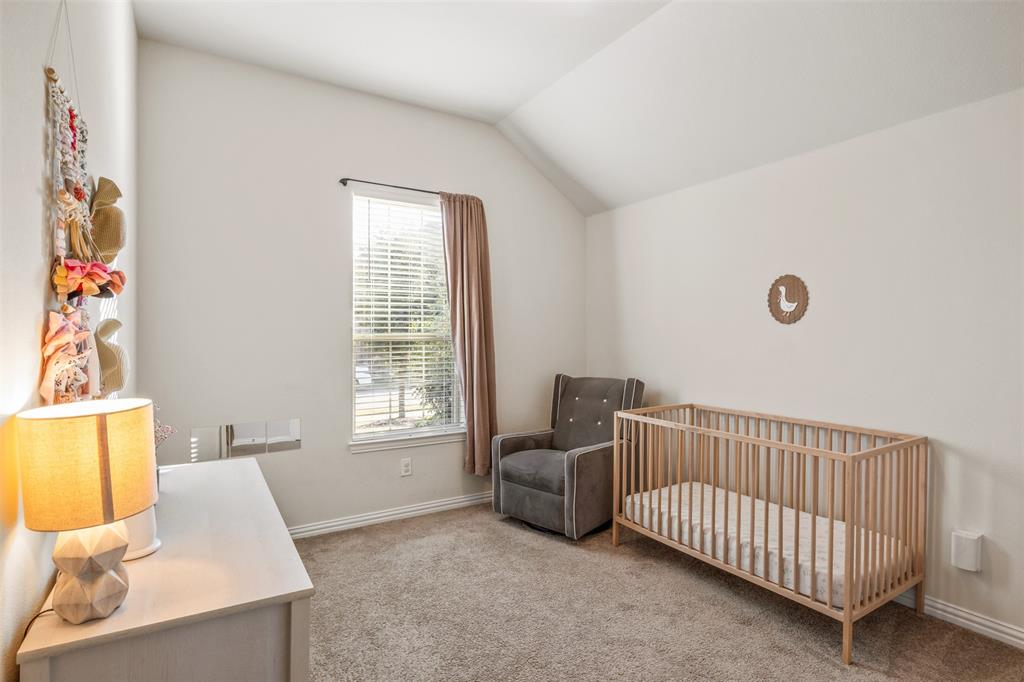 317 Timberline Drive Midlothian, TX 76065 - Photo 16 of 30 a bedroom with furniture and a window