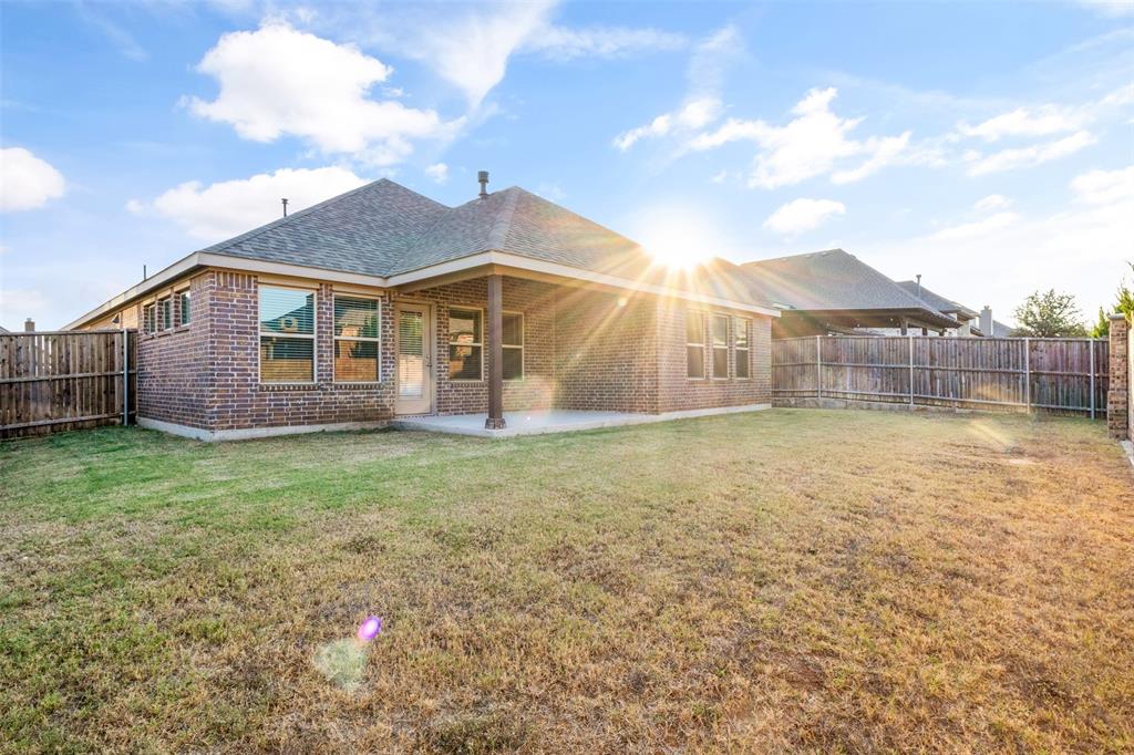 317 Timberline Drive Midlothian, TX 76065 - Photo 21 of 30 a view of a house with a backyard