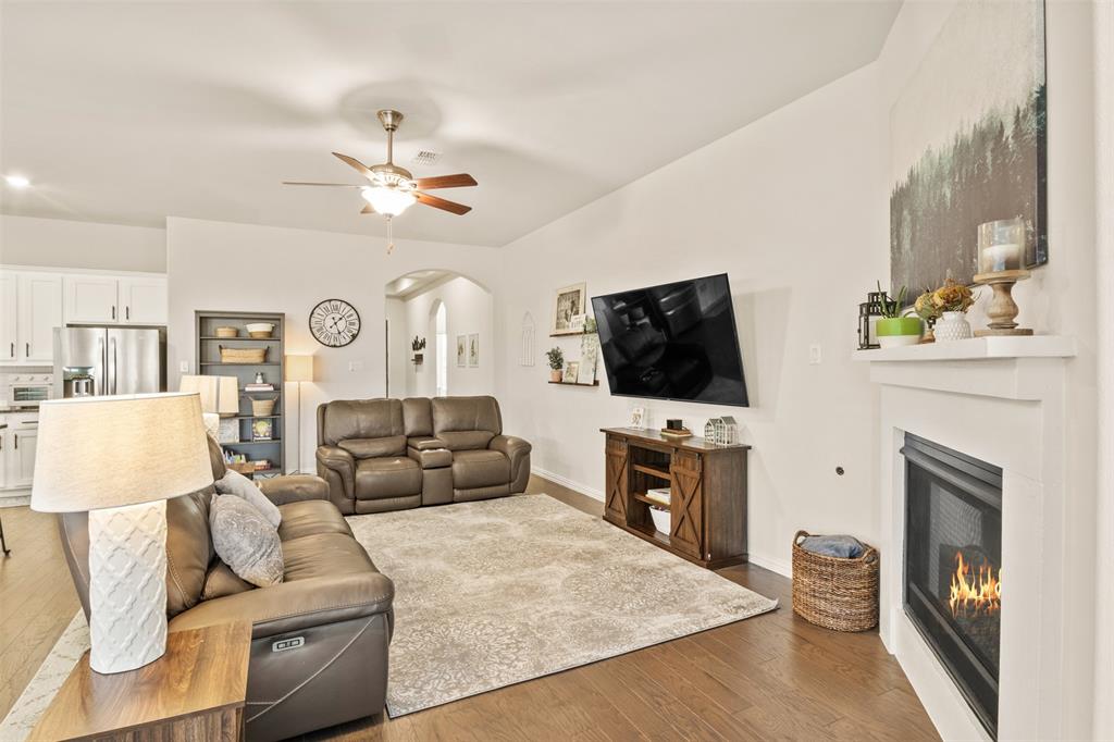 317 Timberline Drive Midlothian, TX 76065 - Photo 7 of 30 a living room with furniture and a flat screen tv