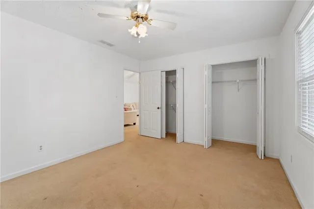 an empty room with a bathroom