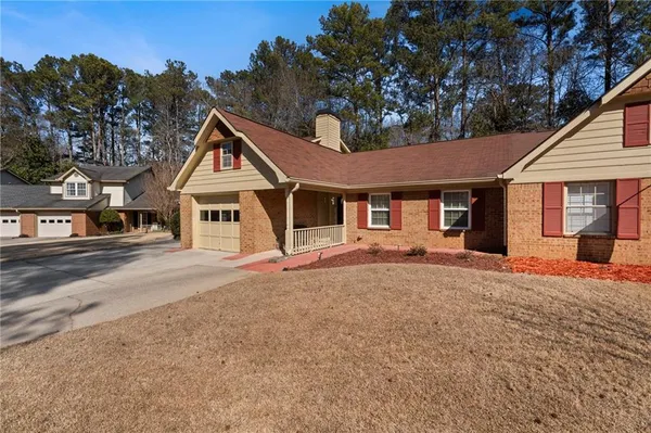 a house with trees in the background