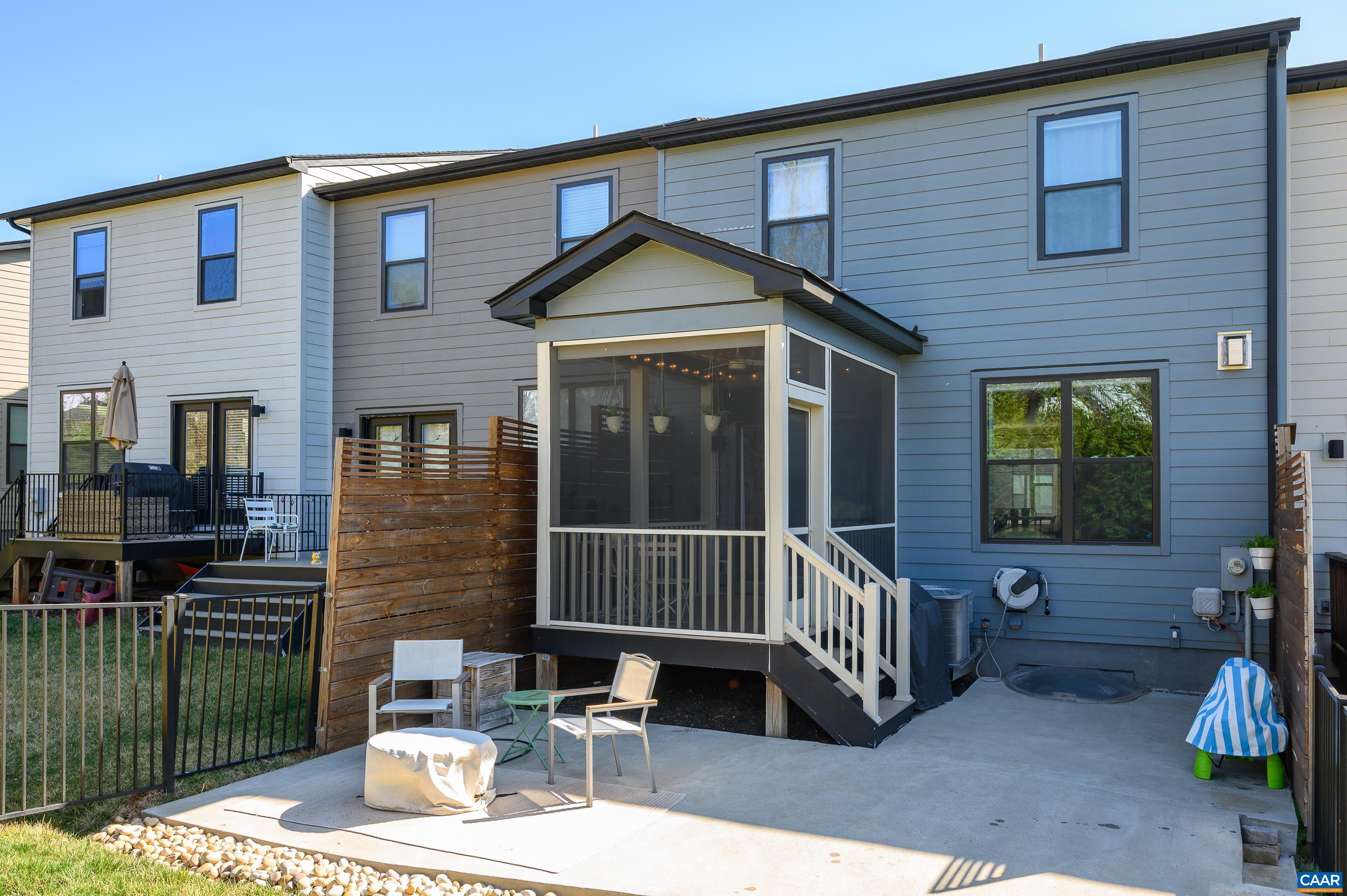 147 Junction Lane Charlottesville, VA 22902 - Photo 24 of 30 a view of house with a deck and furniture