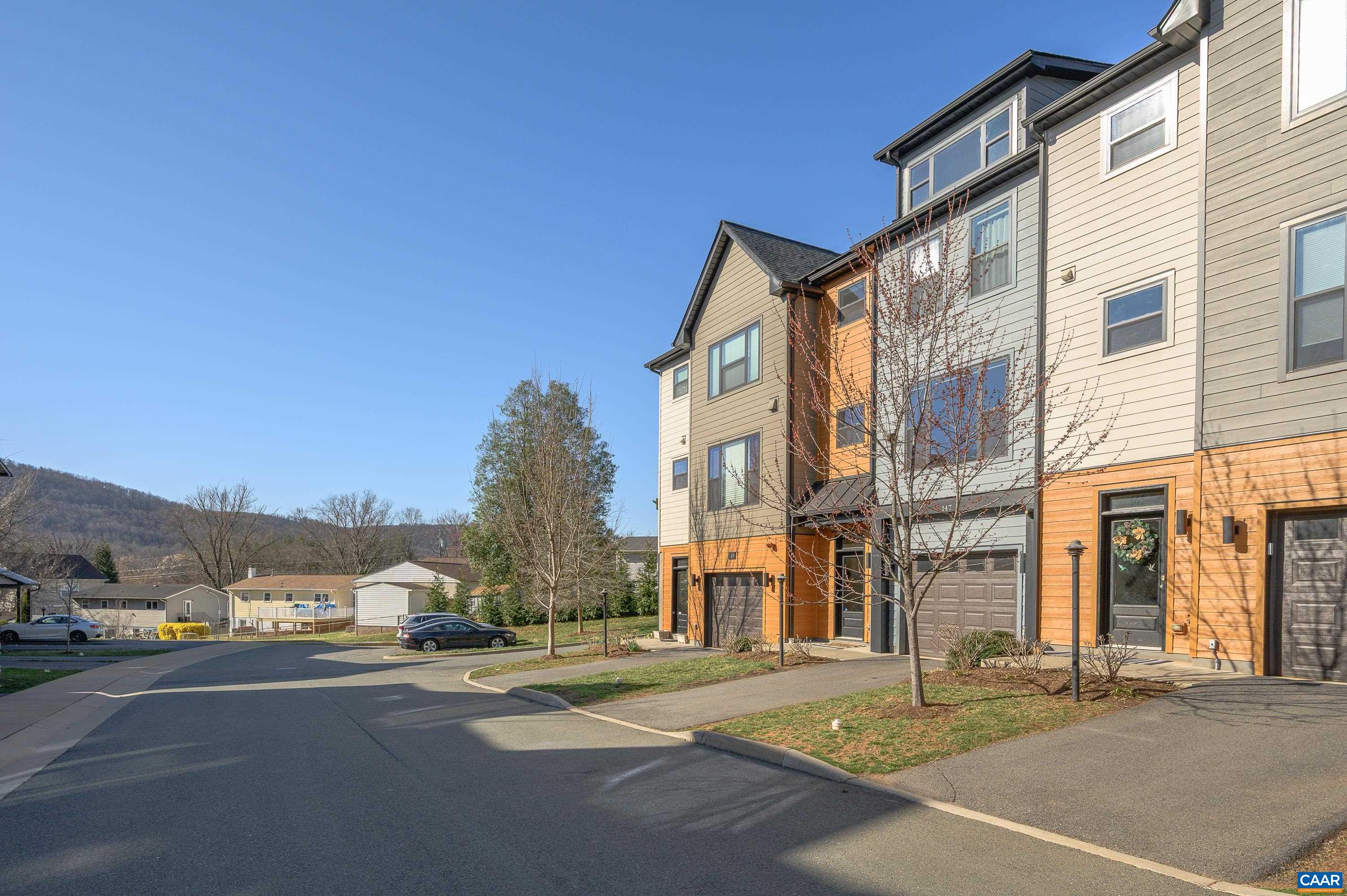 147 Junction Lane Charlottesville, VA 22902 - Photo 3 of 30 a city street lined with buildings and trees
