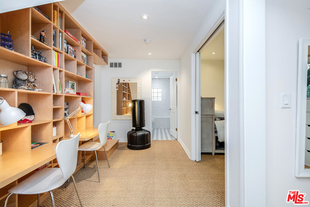 3152 Ellington Drive Los Angeles, CA 90068 - Photo 15 of 21 a view of a living room and workspace