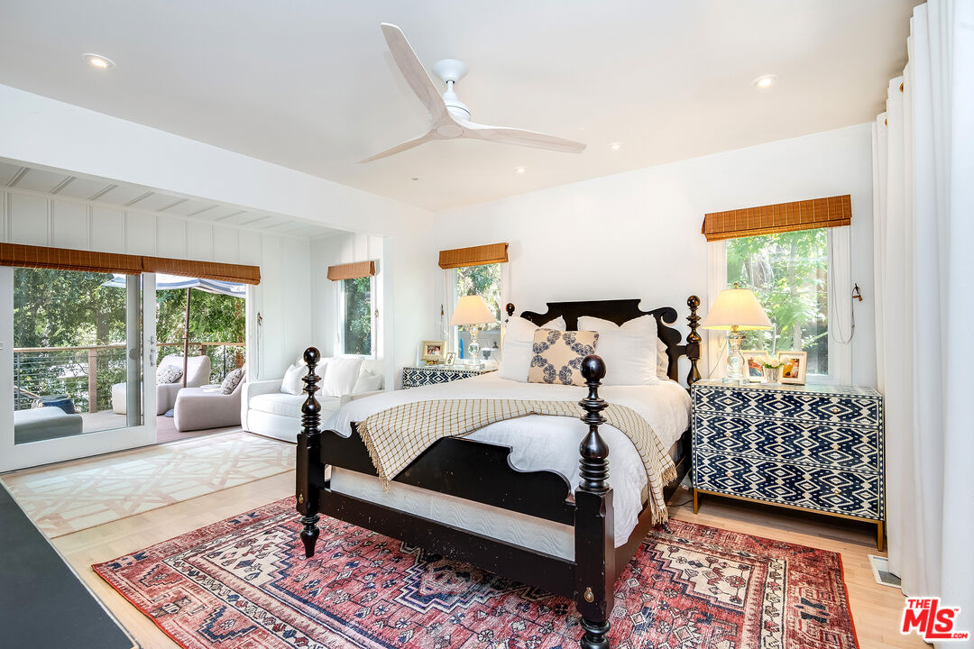 3152 Ellington Drive Los Angeles, CA 90068 - Photo 5 of 21 a bed room with a bed and a couch