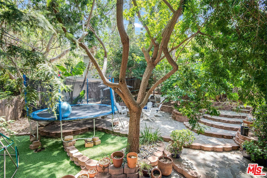 3152 Ellington Drive Los Angeles, CA 90068 - Photo 7 of 21 a view of a backyard with sitting area