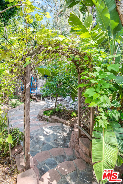 3152 Ellington Drive Los Angeles, CA 90068 - Photo 8 of 21 a view of a pathway with a tree