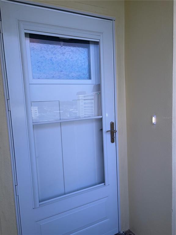 4750 Cove Circle, Unit 904 St. Petersburg, FL 33708 - Photo 25 of 37 a bathroom with a shower