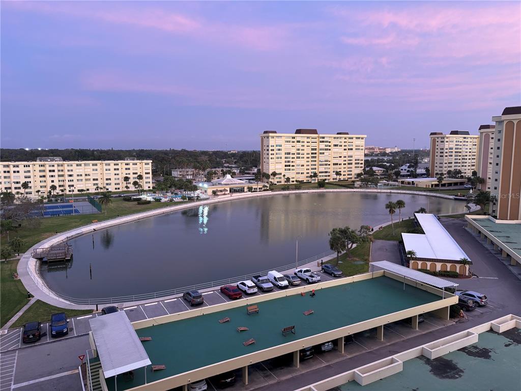 4750 Cove Circle, Unit 904 St. Petersburg, FL 33708 - Photo 28 of 37 a view of a tennis court