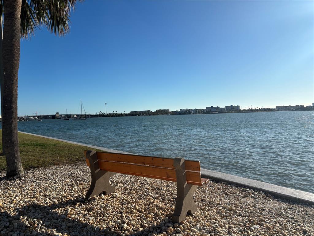 4750 Cove Circle, Unit 904 St. Petersburg, FL 33708 - Photo 35 of 37 a view of a lake next to a lake view