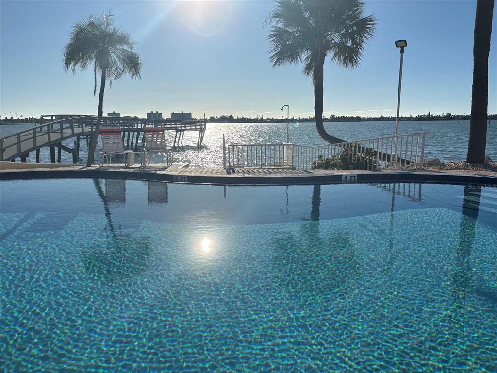 4750 Cove Circle, Unit 904 St. Petersburg, FL 33708 - Photo 37 of 37 a view of outdoor space with outdoor seating