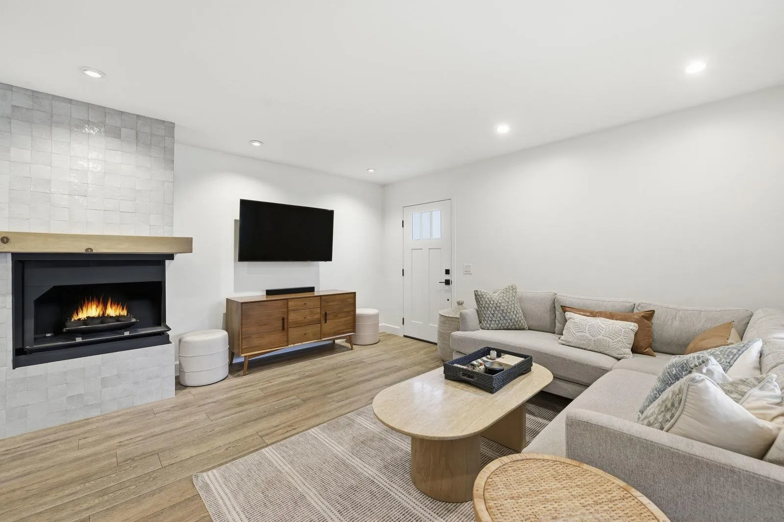 1422 Caminito Septimo Cardiff, CA 92007 - Photo 12 of 27 a living room with furniture and a fireplace