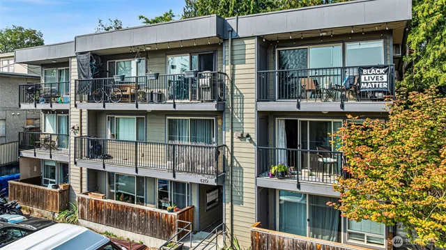 a view of residential houses with stairs