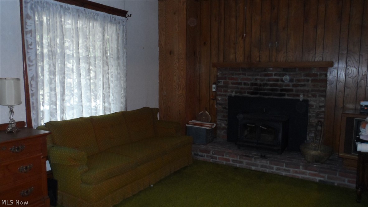 202 South Chestnut Street Kent, OH 44240 - Photo 7 of 35 living area with wood burning fireplace