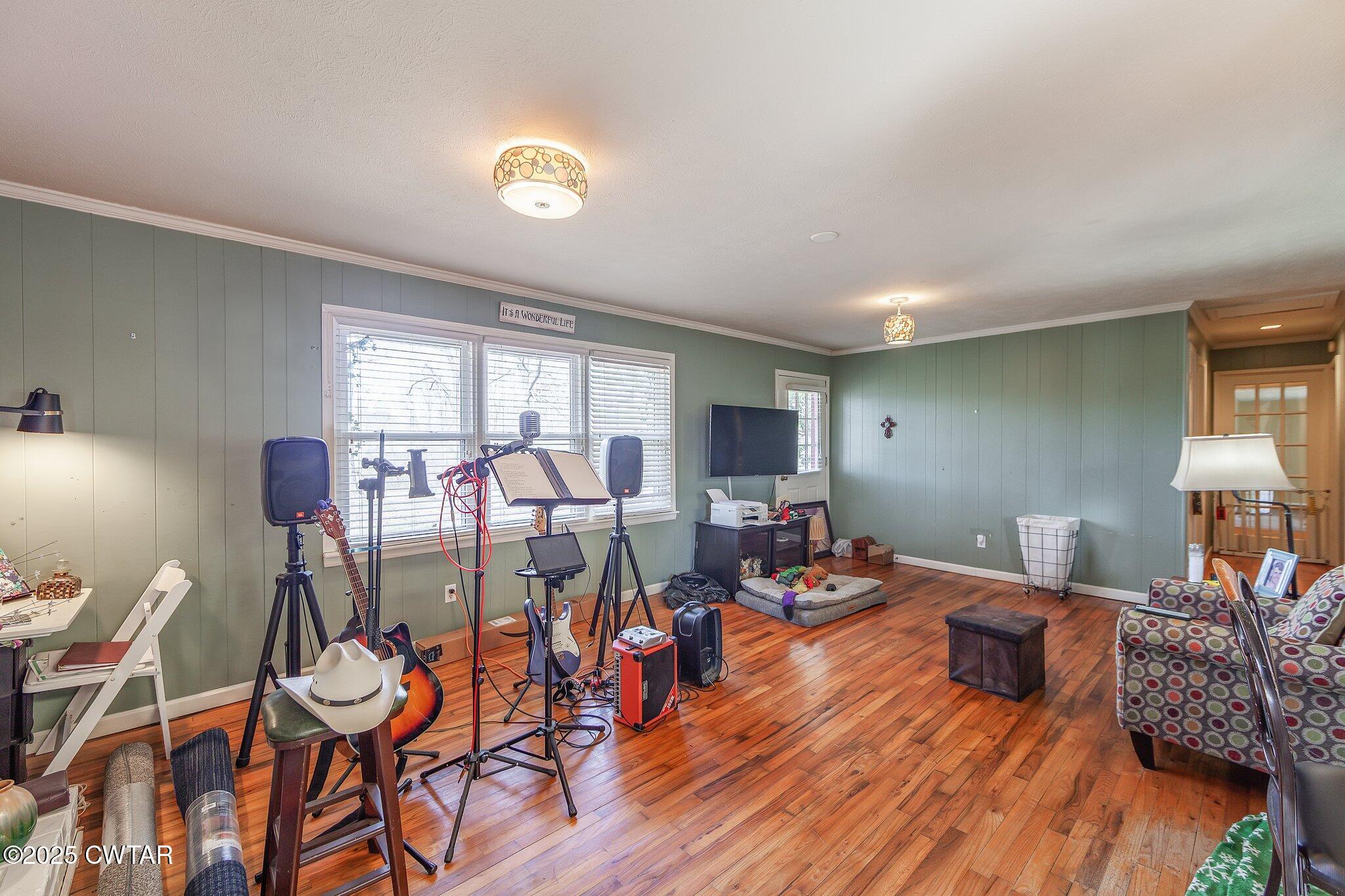 196 Pierce Road Beech Bluff, TN 38313 - Photo 19 of 63 a living room with furniture and wooden floor
