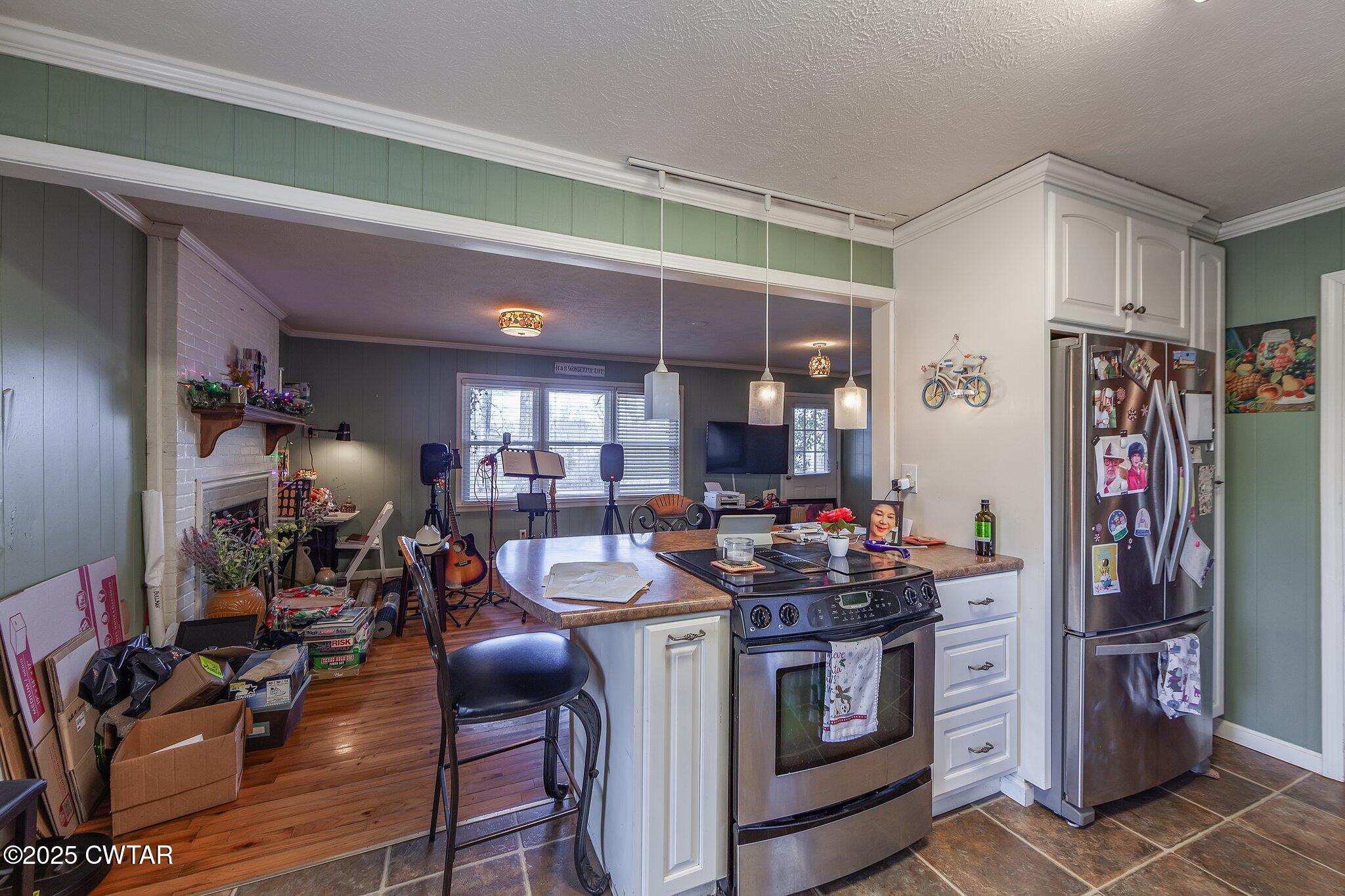 196 Pierce Road Beech Bluff, TN 38313 - Photo 22 of 63 a view of a kitchen with appliances and cabinets