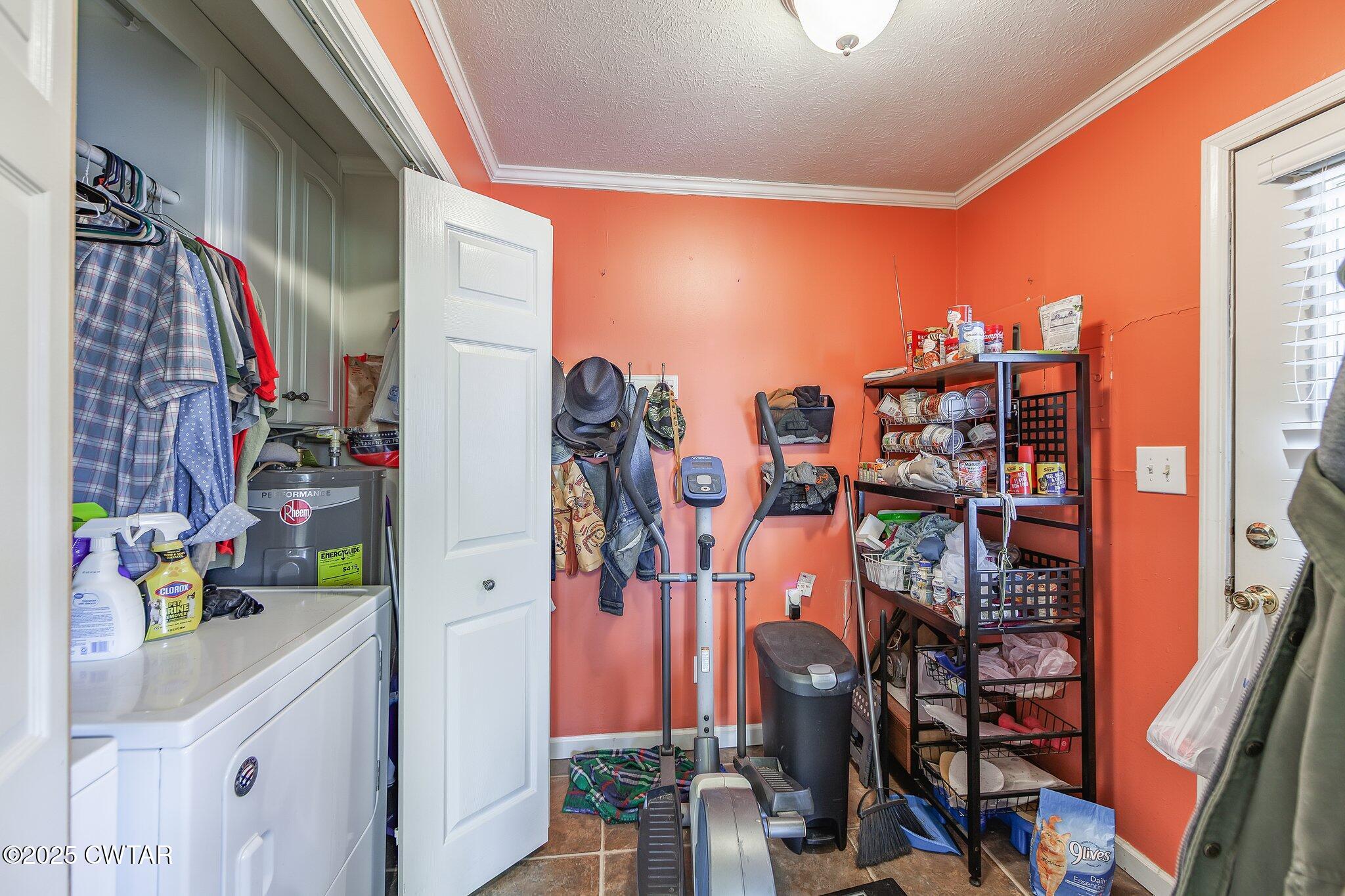 196 Pierce Road Beech Bluff, TN 38313 - Photo 24 of 63 a view of walk in closet with clothes and shoes