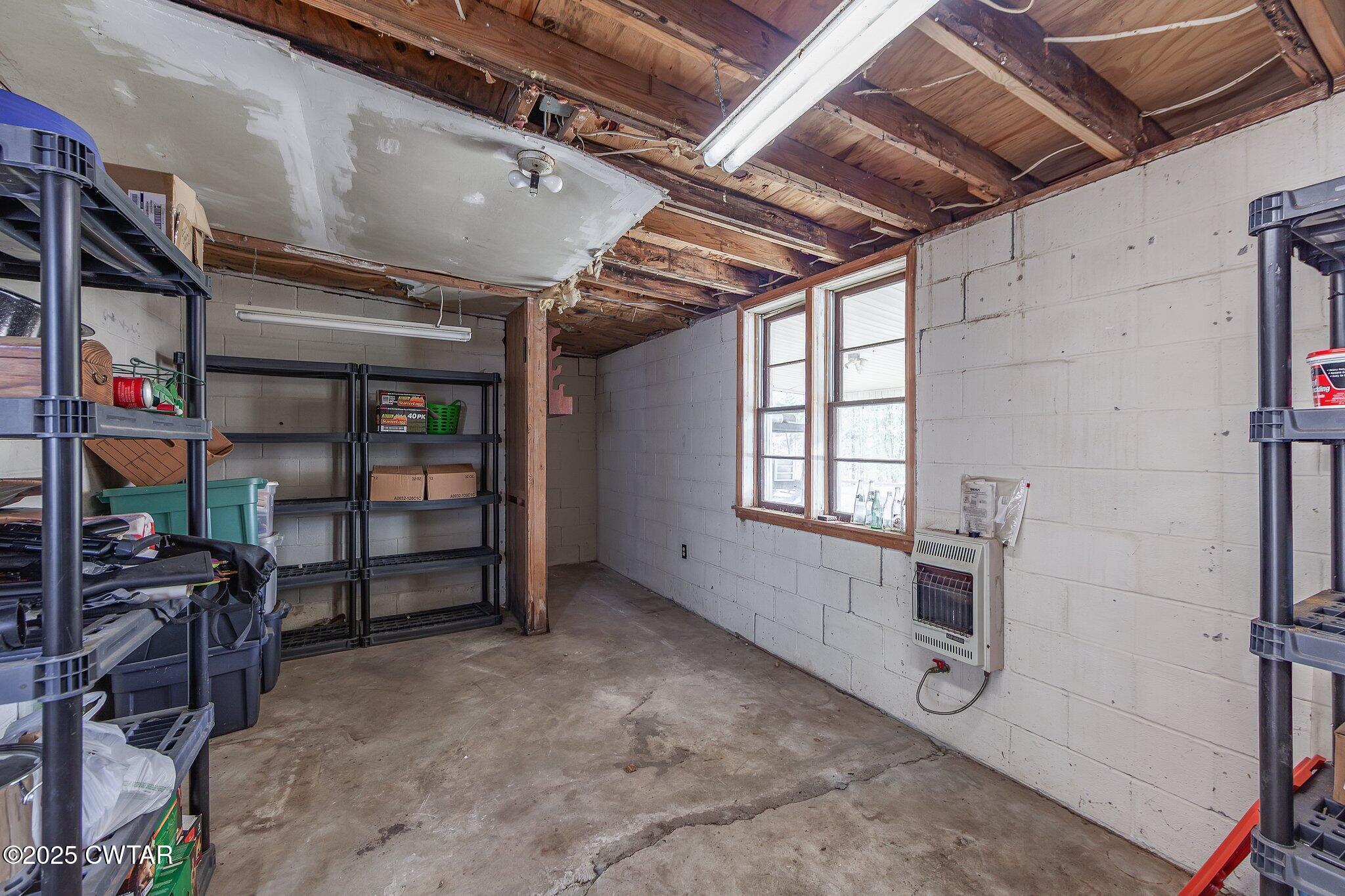 196 Pierce Road Beech Bluff, TN 38313 - Photo 25 of 63 a view of a storage room