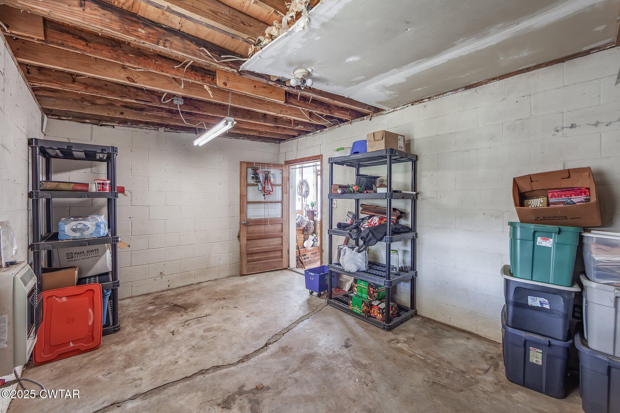 196 Pierce Road Beech Bluff, TN 38313 - Photo 26 of 63 a view of storage and utility room